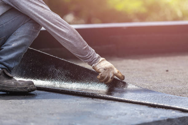 Professional Waterproofing technician working in Remus, MI